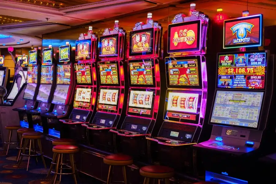 casino staff assisting guests on gaming floor
