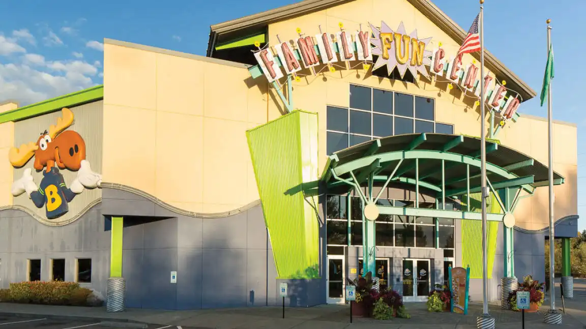 family entertainment center staff assisting guests