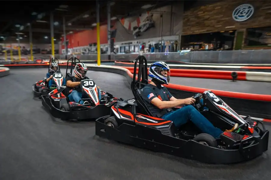 go kart track staff supervising race operations