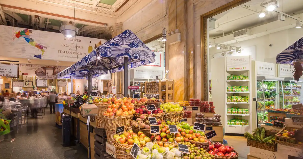 specialty food store employees assisting customers